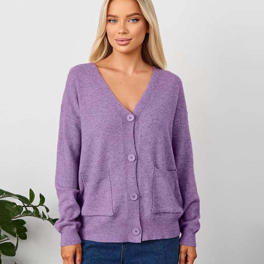 Løs cardigan med påsatte lommer
