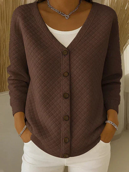 Quiltet cardigan med lommer og knapper