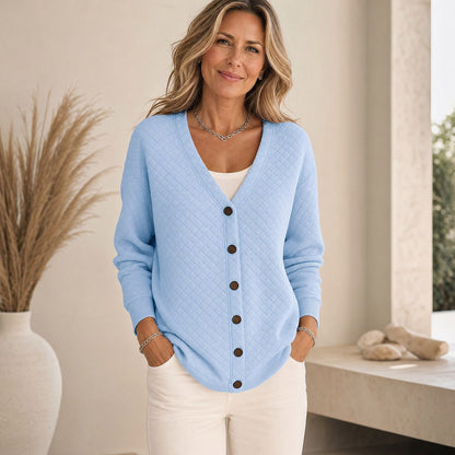 Quiltet cardigan med lommer og knapper