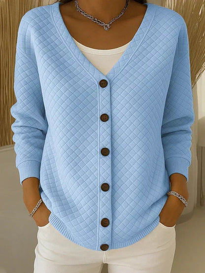 Quiltet cardigan med lommer og knapper