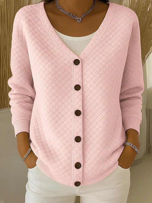 Quiltet cardigan med lommer og knapper