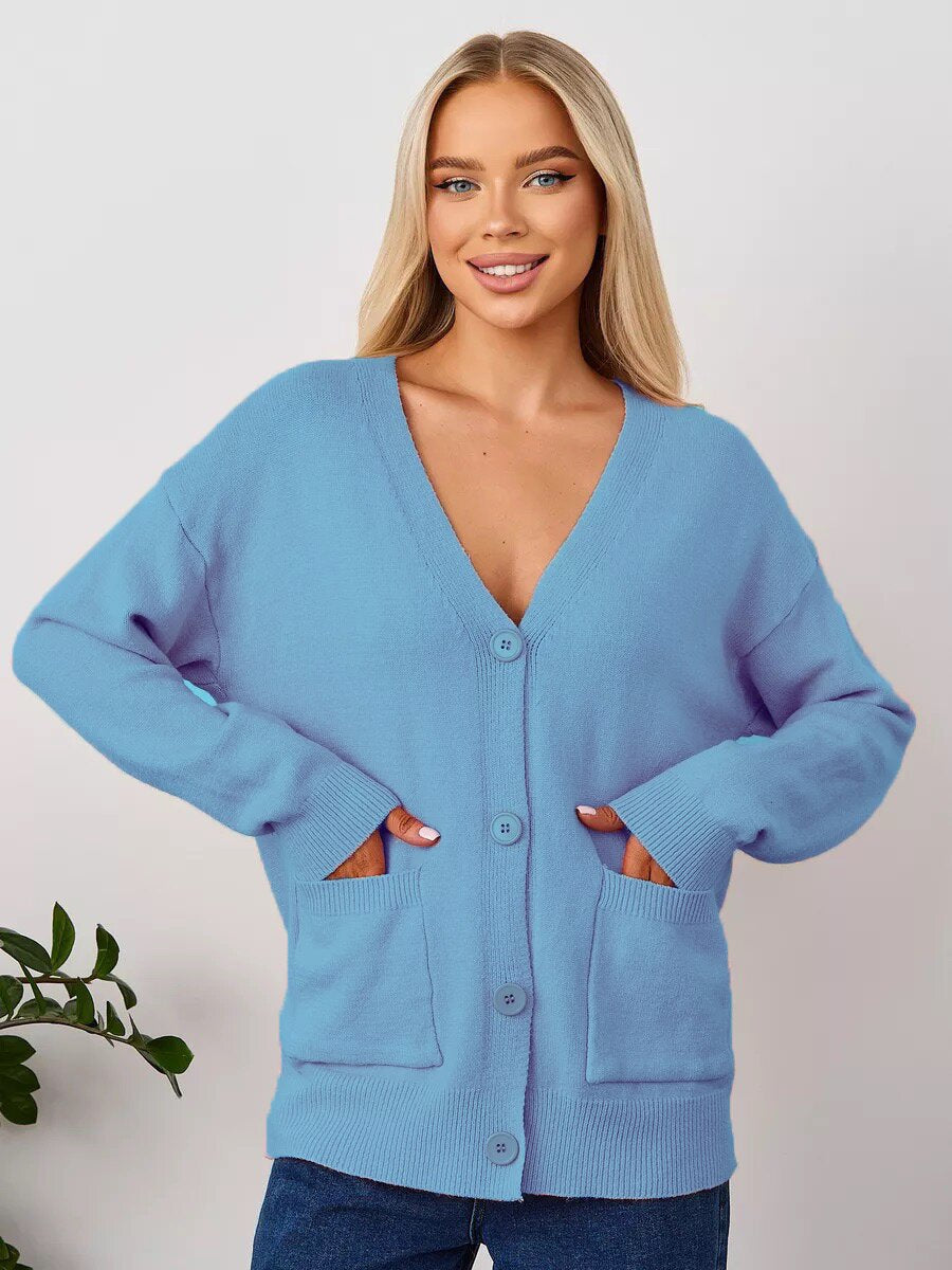 Løs cardigan med påsatte lommer