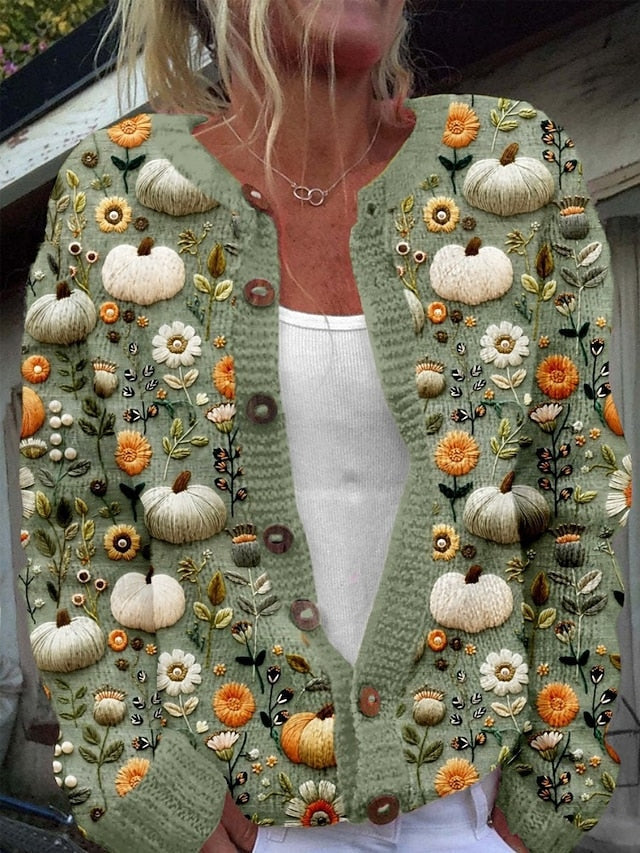 Grovstrikket cardigan med blomster i relief