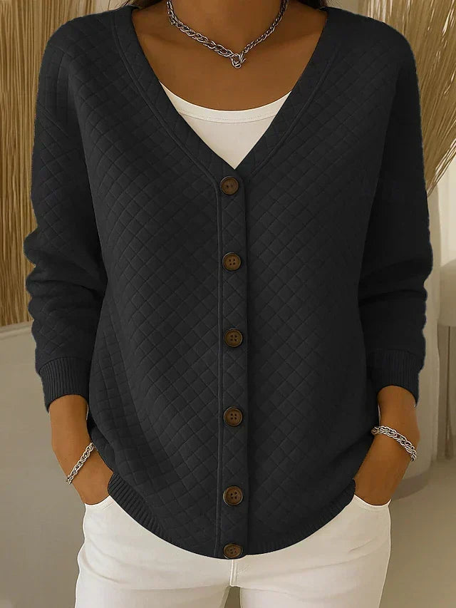Quiltet cardigan med lommer og knapper