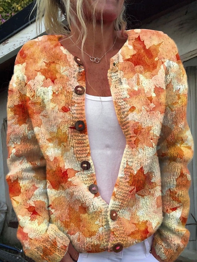 Grovstrikket cardigan med blomster i relief