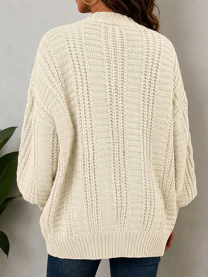Oversized cardigan i tung kabelstrik
