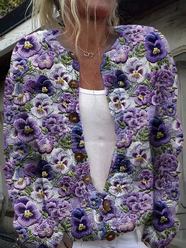 Grovstrikket cardigan med blomster i relief