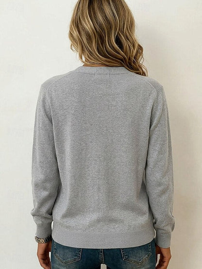 Finstrikket cardigan med V-hals og lommer
