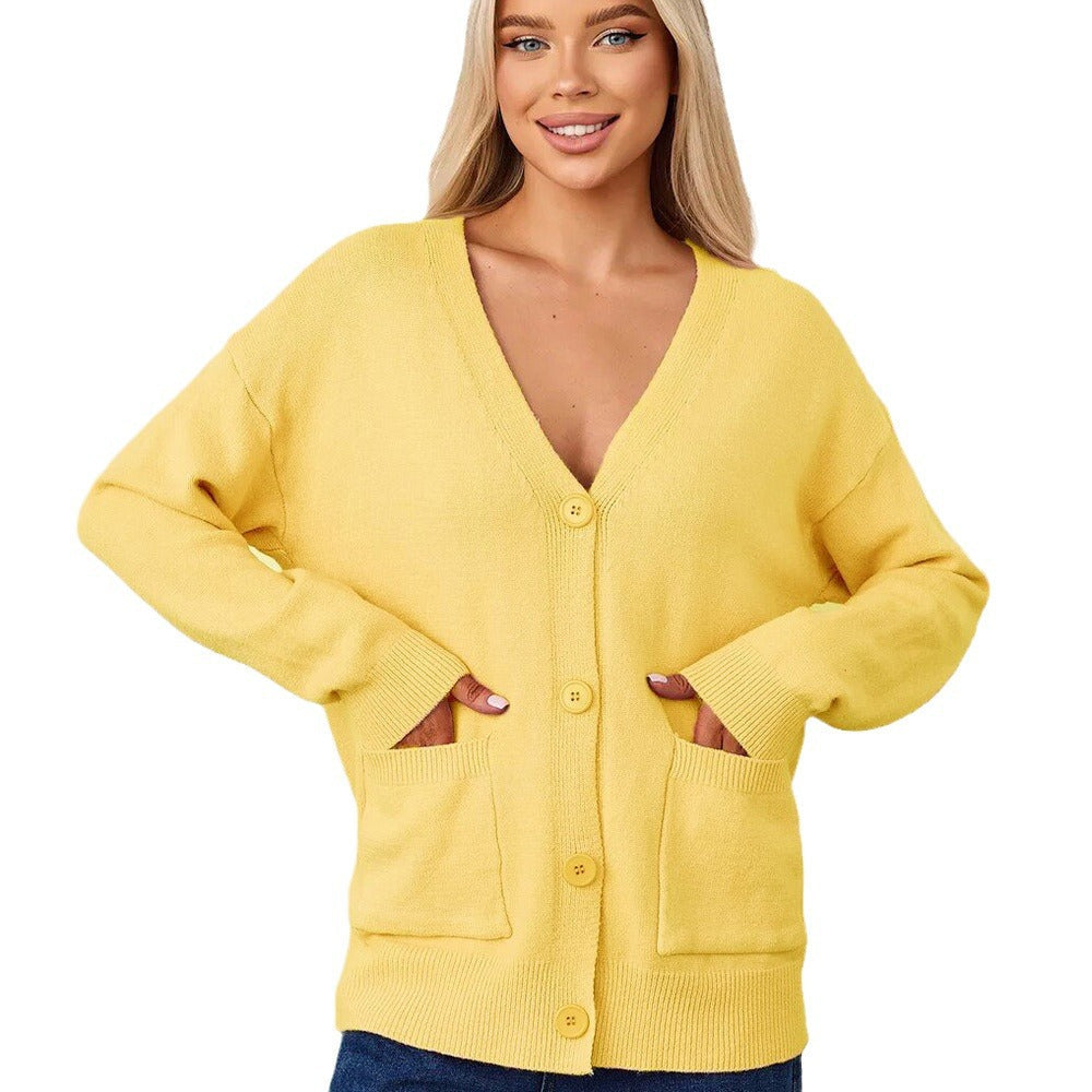 Løs cardigan med påsatte lommer