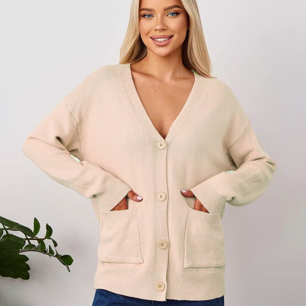 Løs cardigan med påsatte lommer